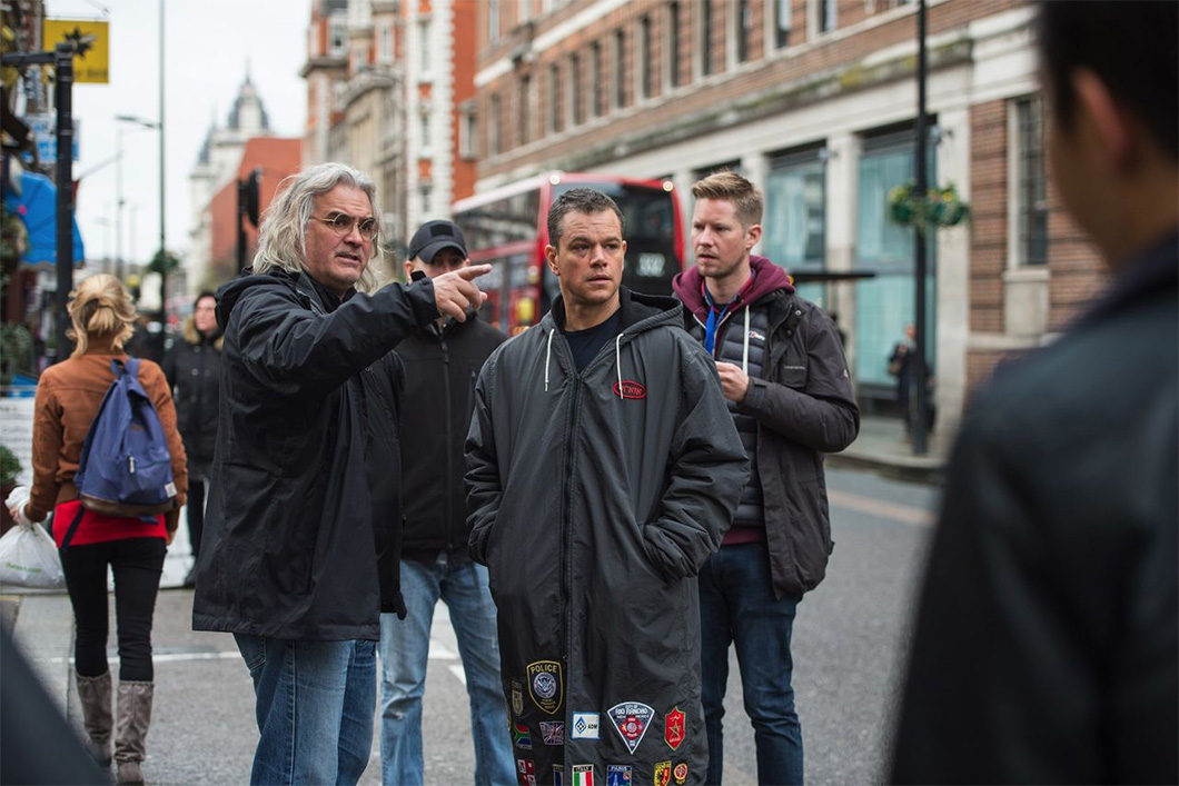 O diretor Paul Greengrass e Matt Damon no set