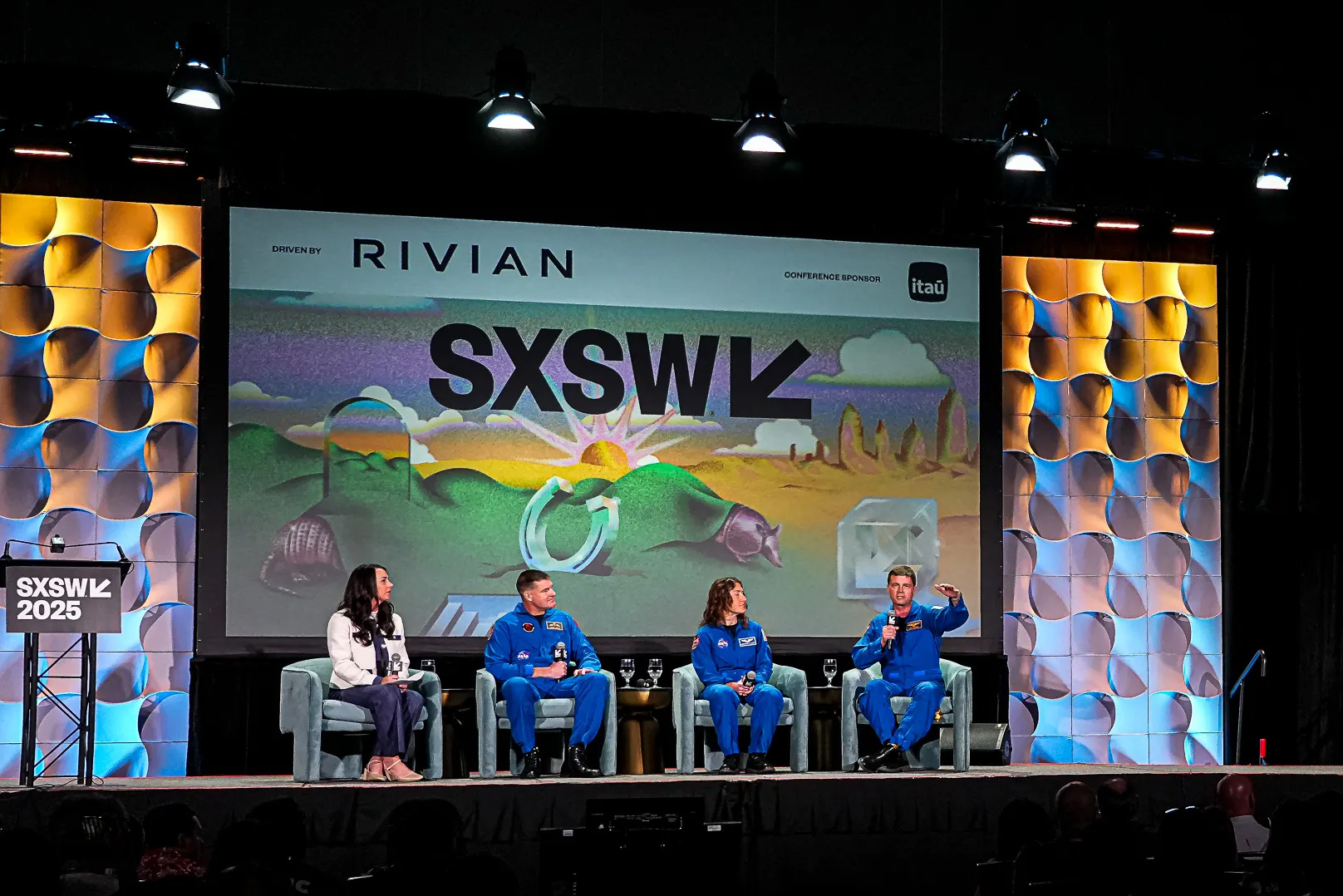 Person, Chair, Furniture, Clothing, Footwear, Shoe, Art, Painting, Crowd, Reality Show Judges Panel, Adult, Male, Man