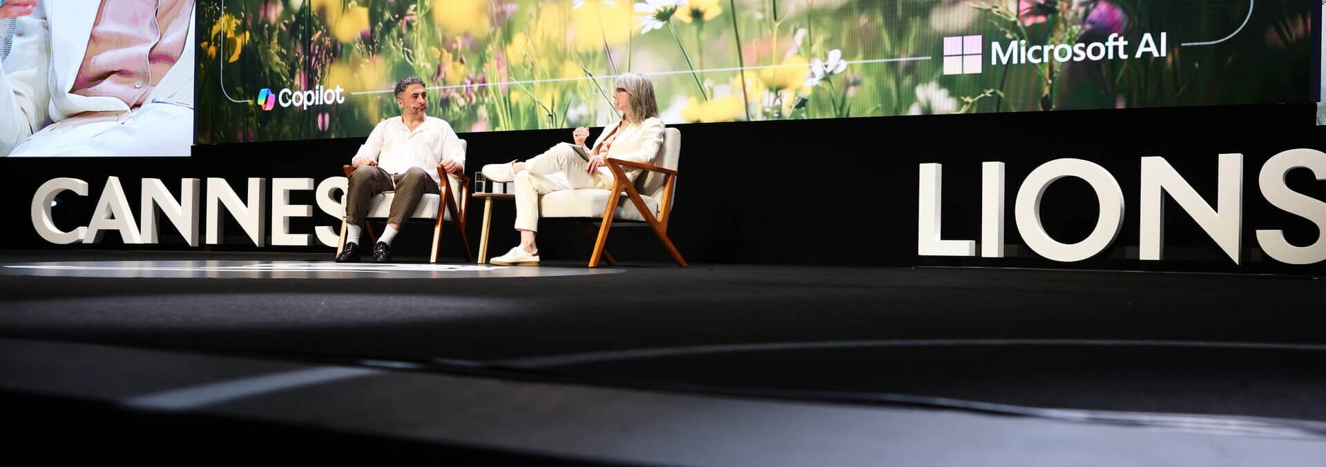 Adult, FemAle, Person, Woman, Clothing, Coat, Photography, Concert, Crowd, Formal Wear, Accessories, Tie, Flower, Plant, Advertisement, Electronics, Screen, Footwear, Shoe, People