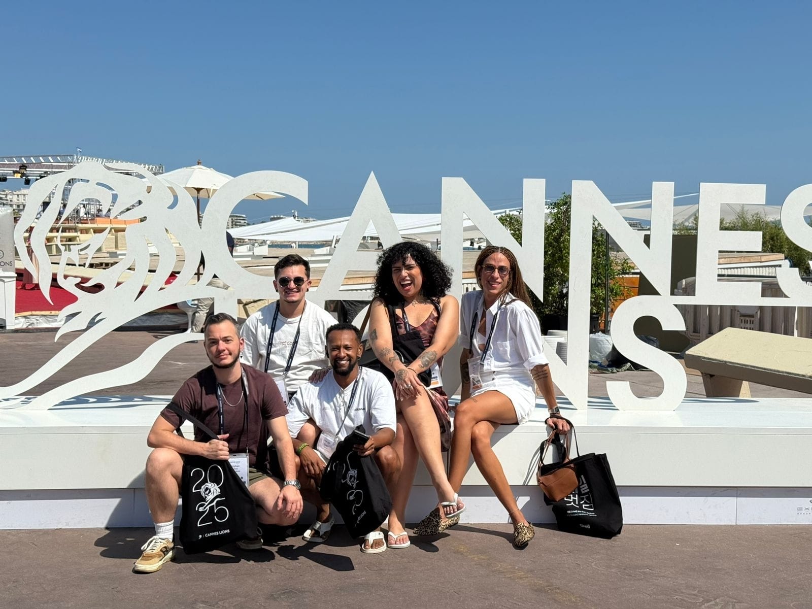 People, Person, Adult, FemAle, Woman, Male, Man, Accessories, Glasses, Groupshot, Clothing, Footwear, Shoe, Shorts, Bag, Handbag, face, Head, Photography, Portrait