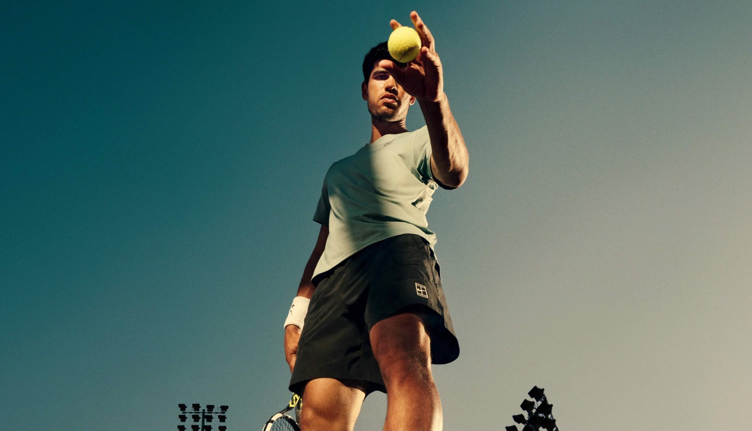  Clothing, Shorts, Adult, Male, Man, Person, Sphere, People, Throwing, Ball, Sport, Tennis, Tennis Ball, Racket, Tennis Racket, Playing Volleyball, Volleyball