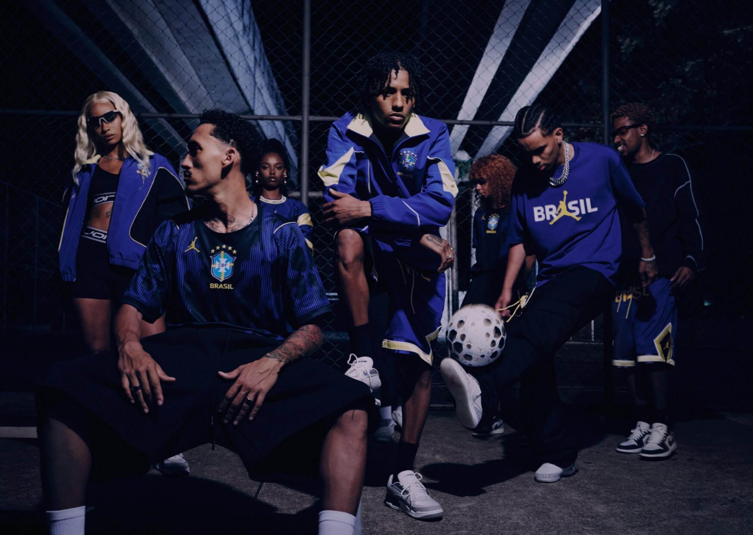  People, Person, Ball, football, Soccer, Soccer Ball, Sport, Accessories, Jewelry, Necklace, Adult, Male, Man, Groupshot, Clothing, Footwear, Shoe, Glasses, Coat