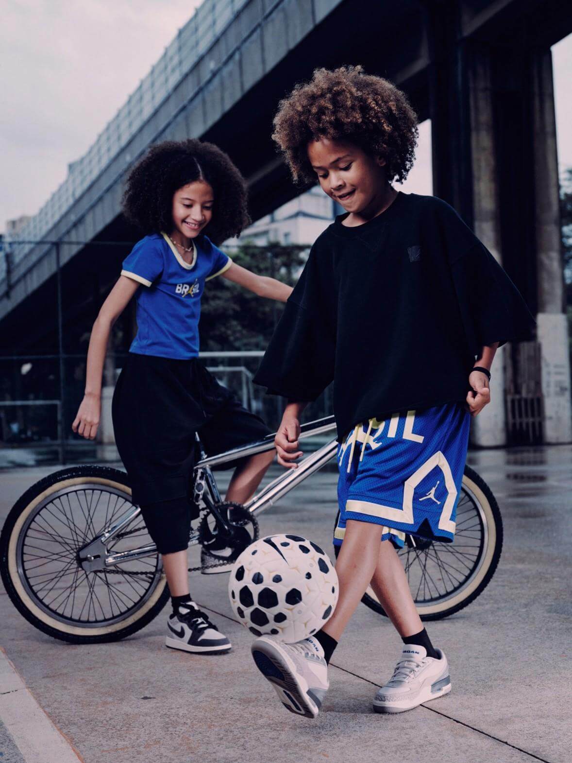  Person, Boy, Male, Teen, Curly Hair, Hair, Ball, football, Soccer, Soccer Ball, Sport, E-scooter, Transportation, Vehicle, Machine, Wheel