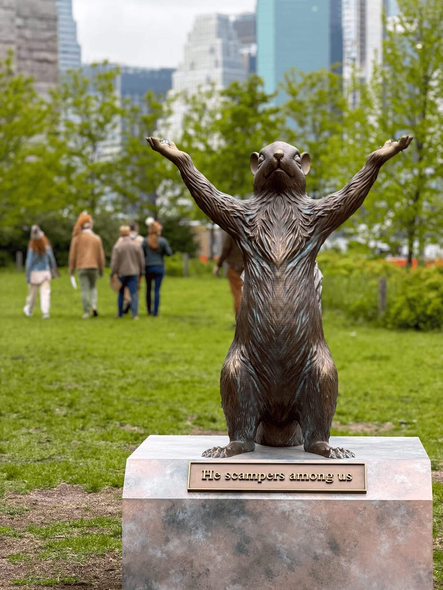  Grass, Nature, Outdoors, Park, Plant, Person, Clothing, Coat, Art, Animal, Bear, Mammal, Wildlife, Sculpture, Statue, Footwear, Shoe